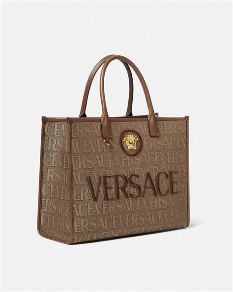 versace bags near me|versace handbags with big zipper.